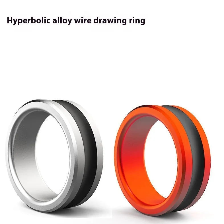 Orange and silver alloy fishing hand guard pull loop tool on a dark background.
