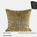 Tuhao gold geometric abstract pattern on a square decorative cushion with tassel detail.