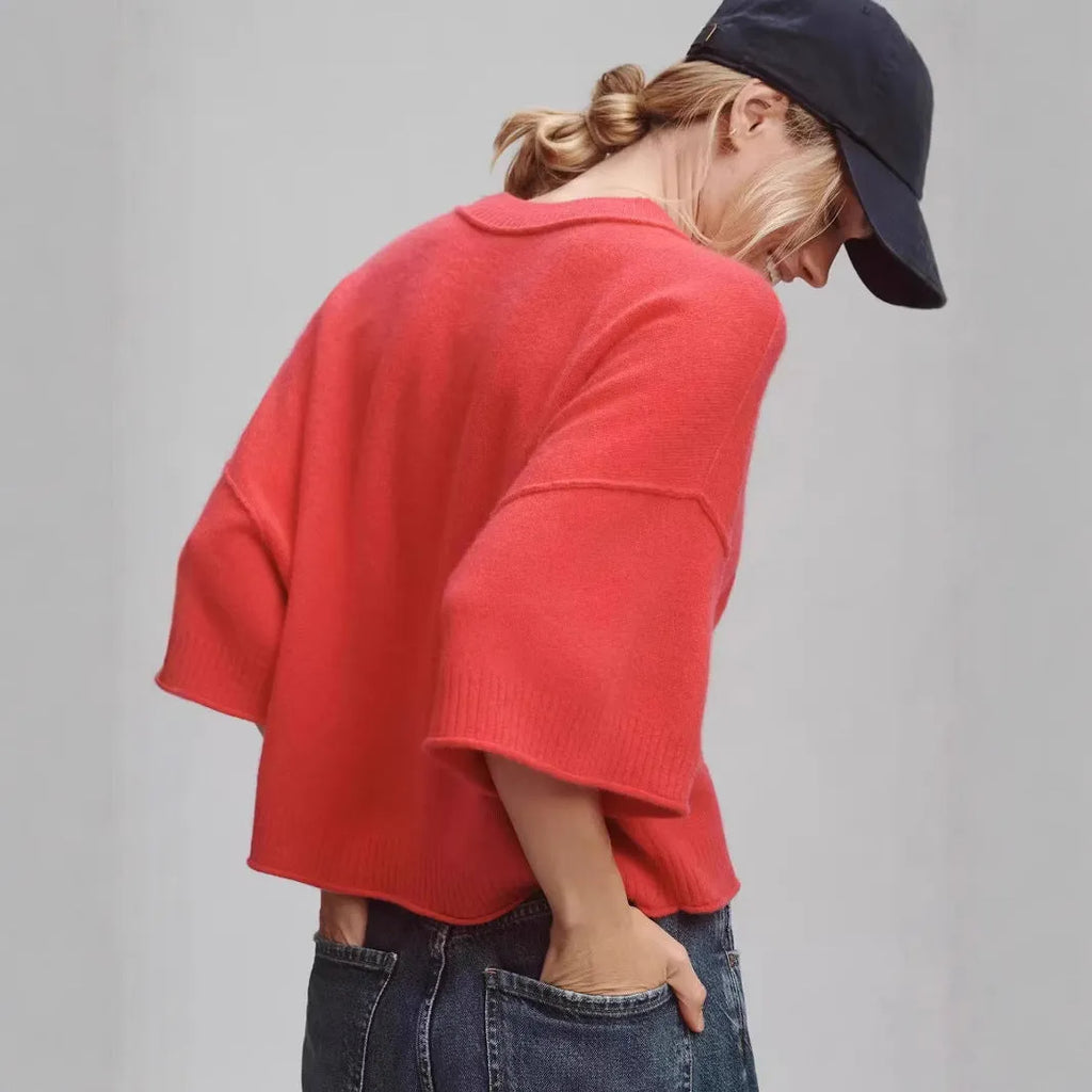 Red cropped viscose T-shirt with regular sleeves and an exposed navel design on a mannequin.