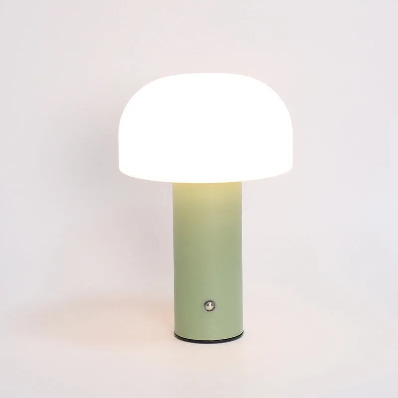 USB dual-purpose table lamp in black, green, orange or white with plug-in and charging functionality