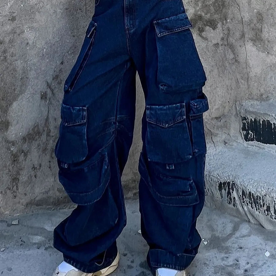 Dark blue women's distressed wide-leg jeans with a high waist and multiple utility pockets.