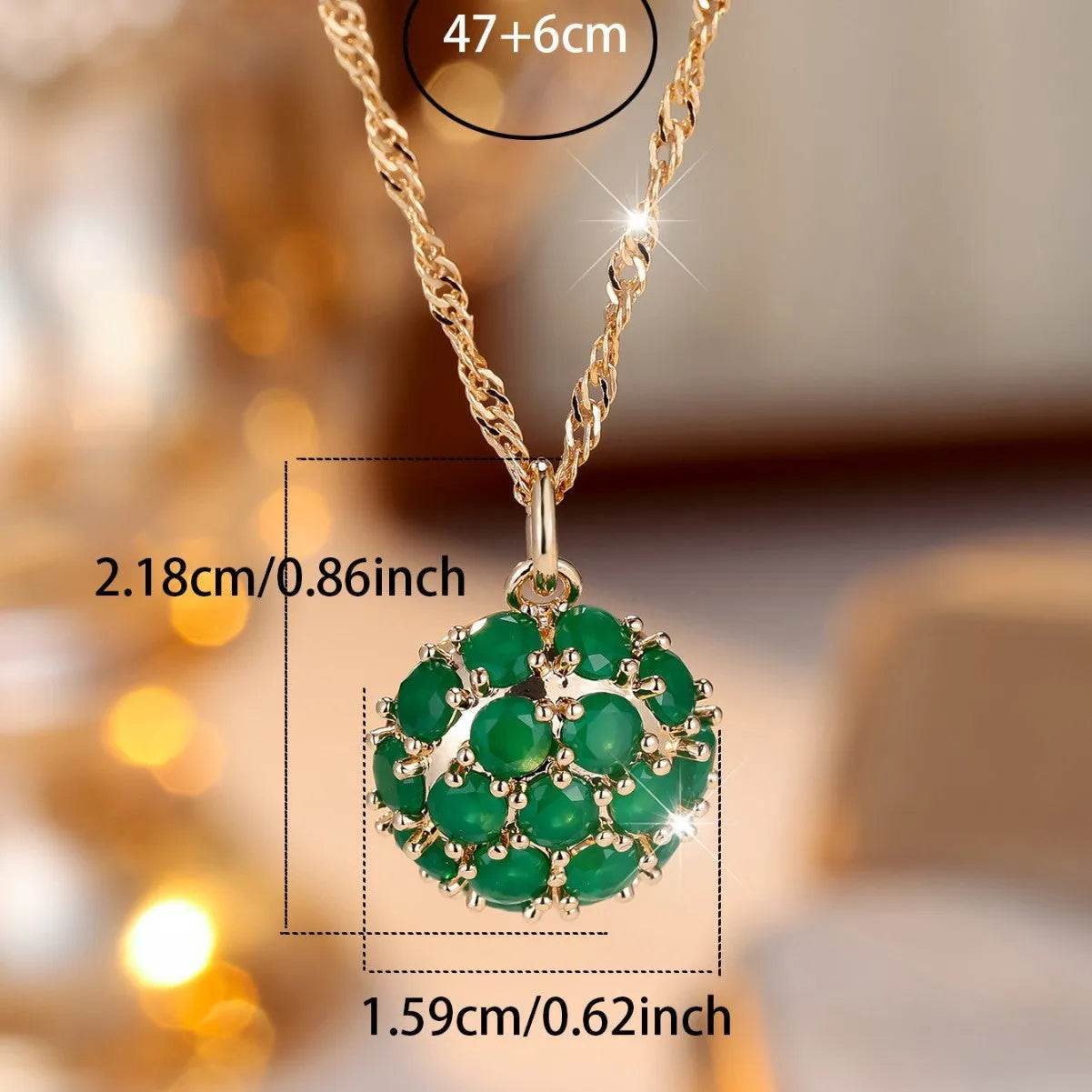 Round emerald diamond necklace with champagne gold electroplated finish on geometric pendant and chain