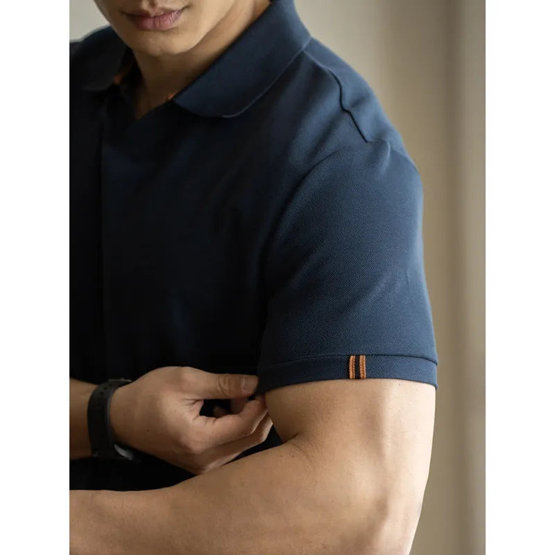 American-style blue cotton polo shirt with short sleeves on hanger