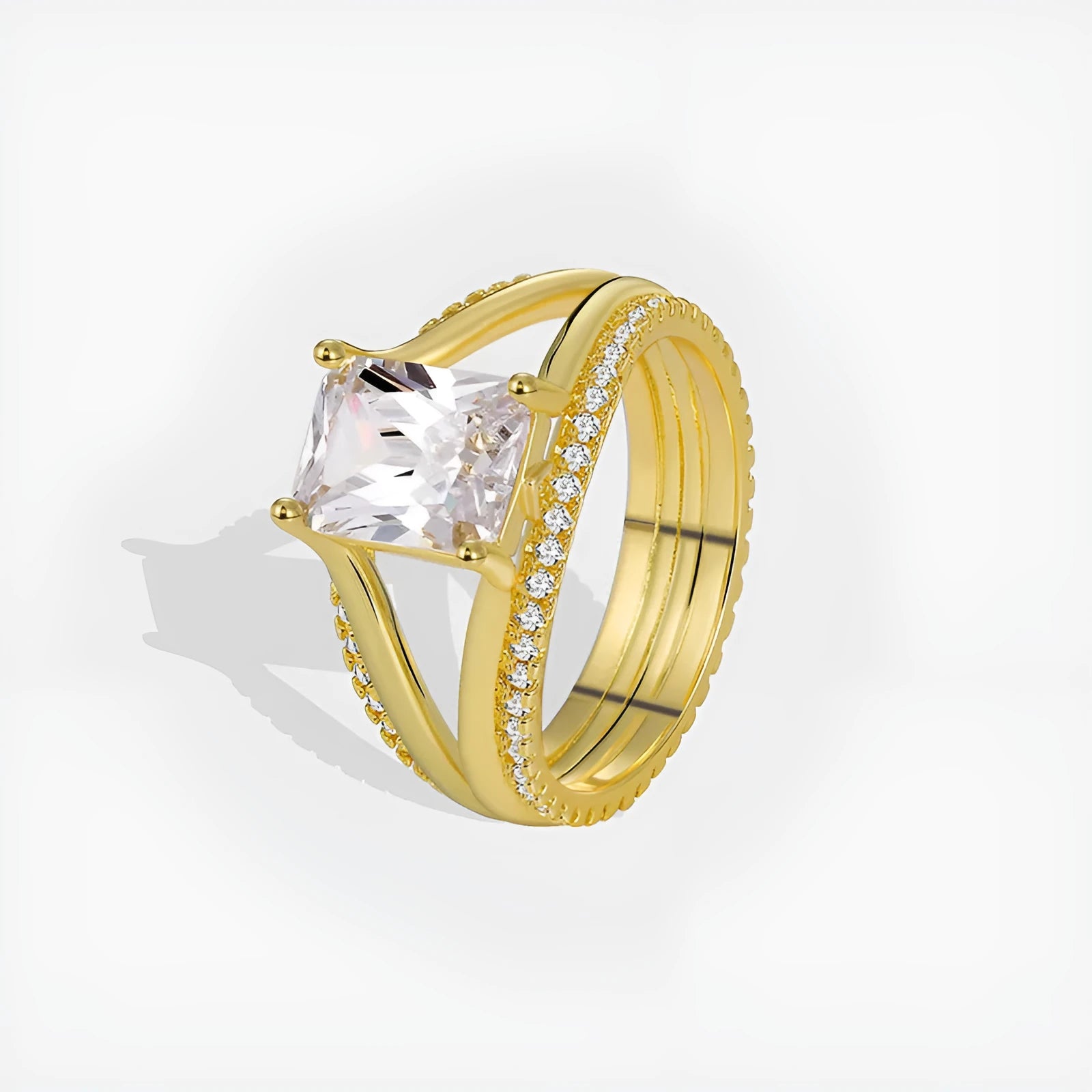 Geometric women's ring with gold electroplated finish and square zircon centrepiece on copper base