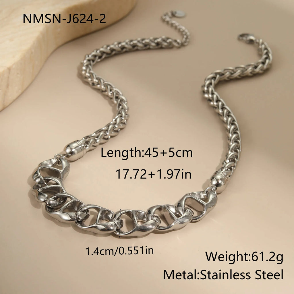 Gold plated stainless steel geometric chain necklace for women on a white background.
