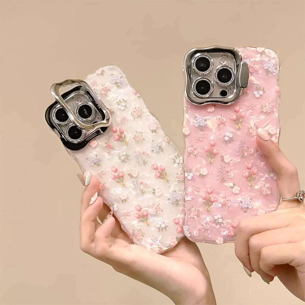 Wave white acrylic iPhone case with embossed floral shell pattern and invisible bracket on a plain background