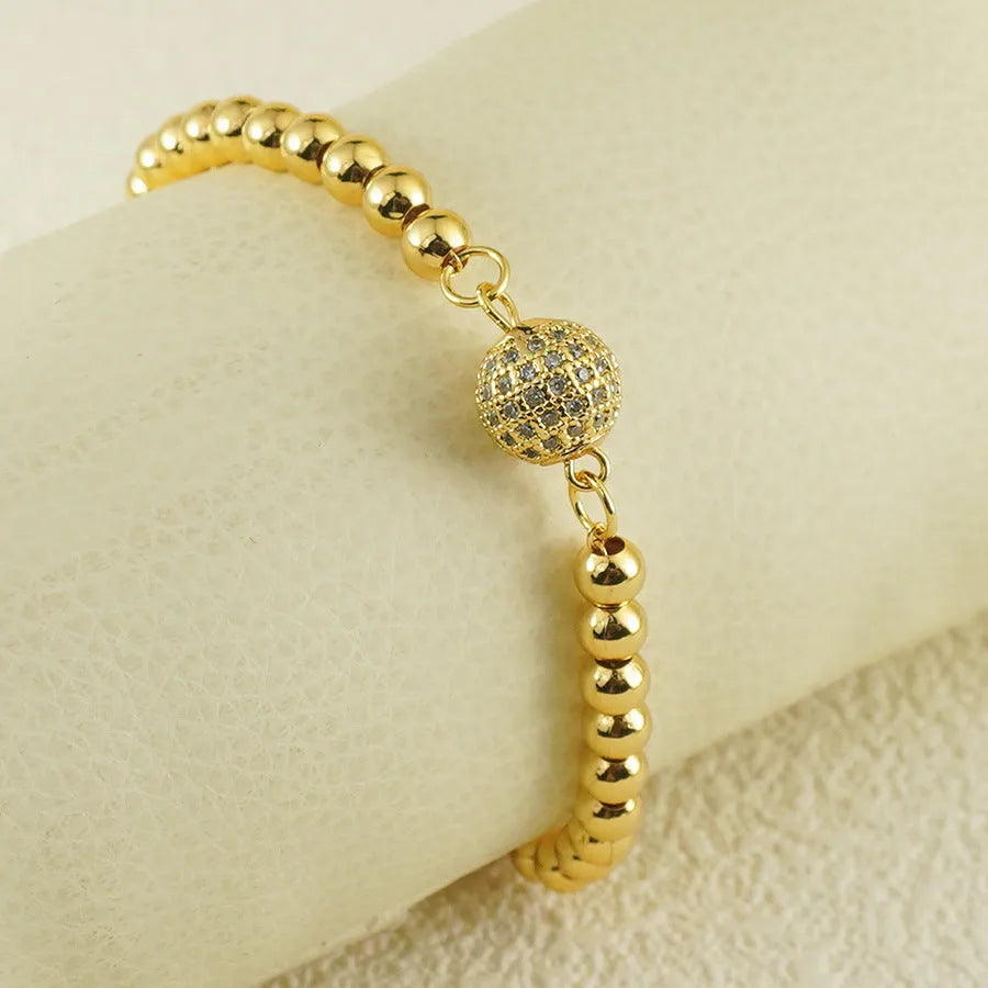 Copper bracelet with zircon stones in Arabic style design featuring heart shape details