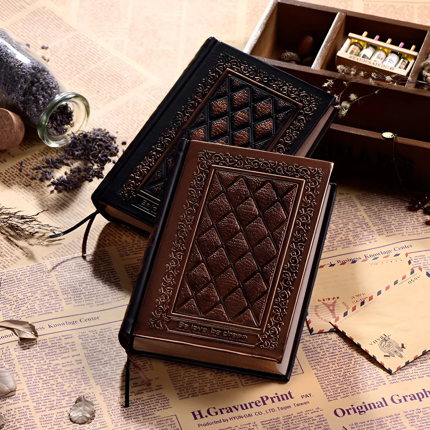 Embossed faux leather notebook with three-dimensional patterns in bronze or black gold colour