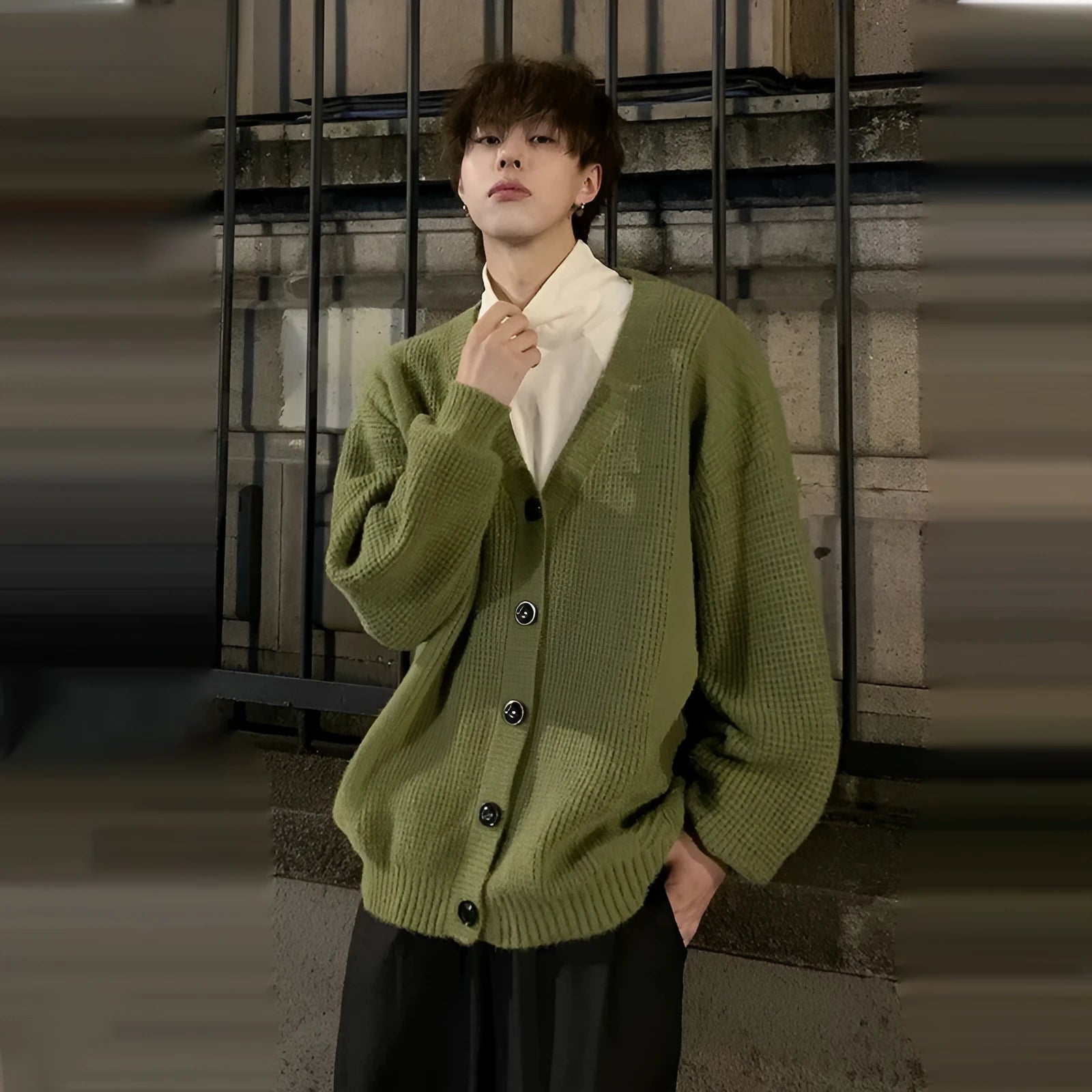 Men's loose fit casual cardigan sweater in army green, shown on a hanger.