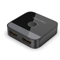 Alloy metal computer audio video converter for HD two-way conversion to television, in black or grey.