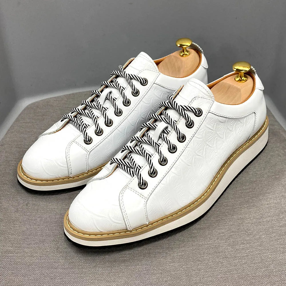 Men's low-top fashion shoes with an embossed pattern on the upper and front-tie laces.