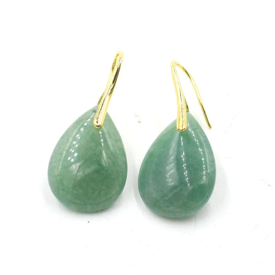 Geometric crystal water drop earrings in amethyst colour with electroplated metal setting.