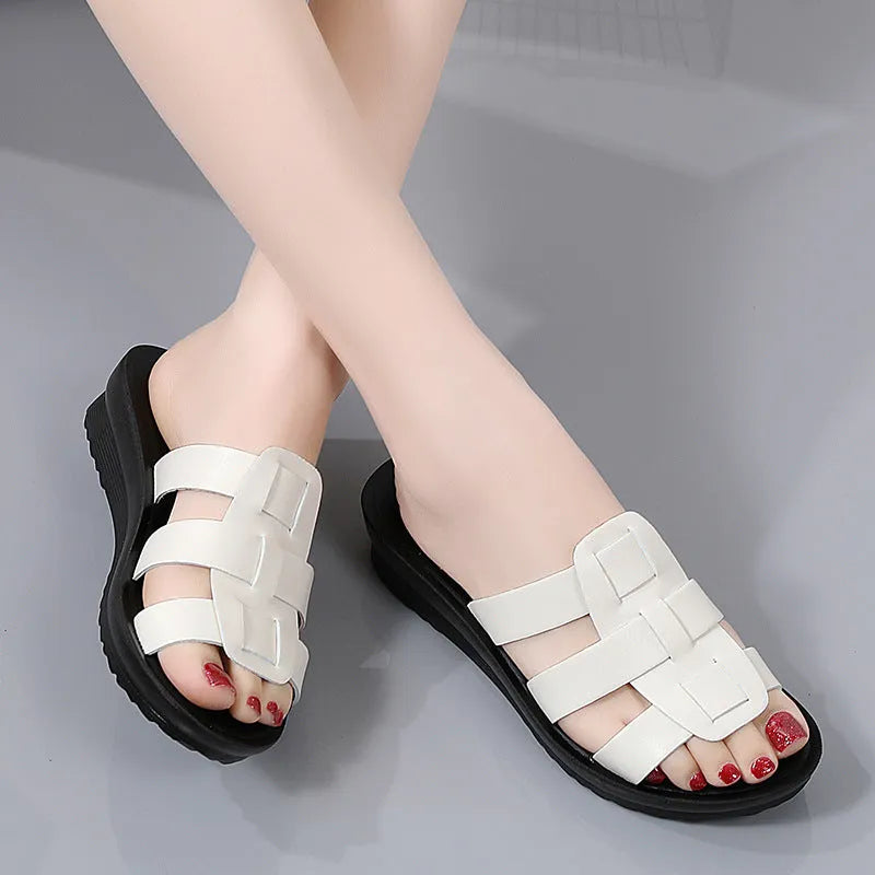 Women's flat bottom slippers in beige, black, and brown with viscose upper and non-slip PU sole