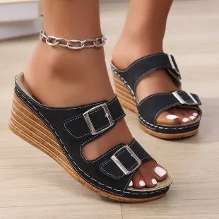 Women's creamy-white wedge beach slippers with buckle strap closure on rubber sole