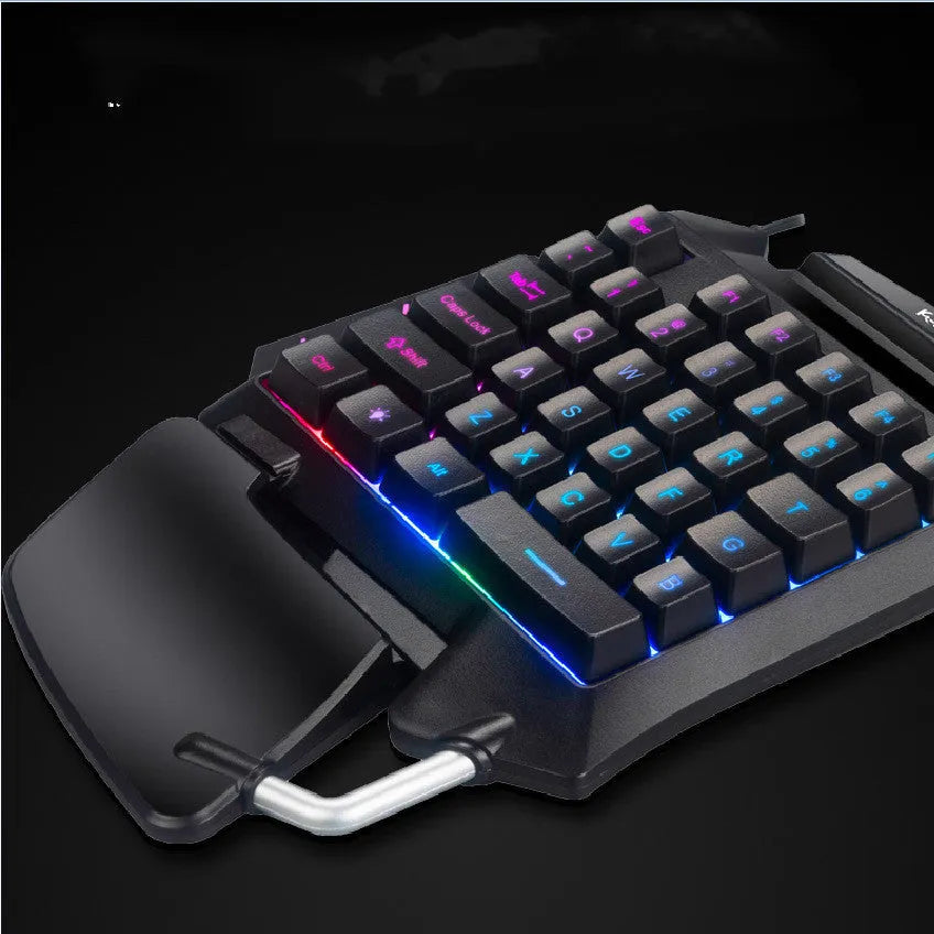 Black left-handed gaming keyboard with detachable palm rest and shortcut keys for desktop gaming