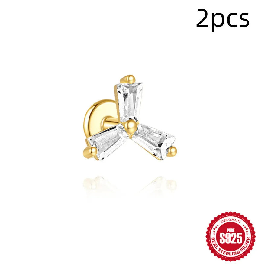 Golden geometric sterling silver earrings with zircon details for double piercings