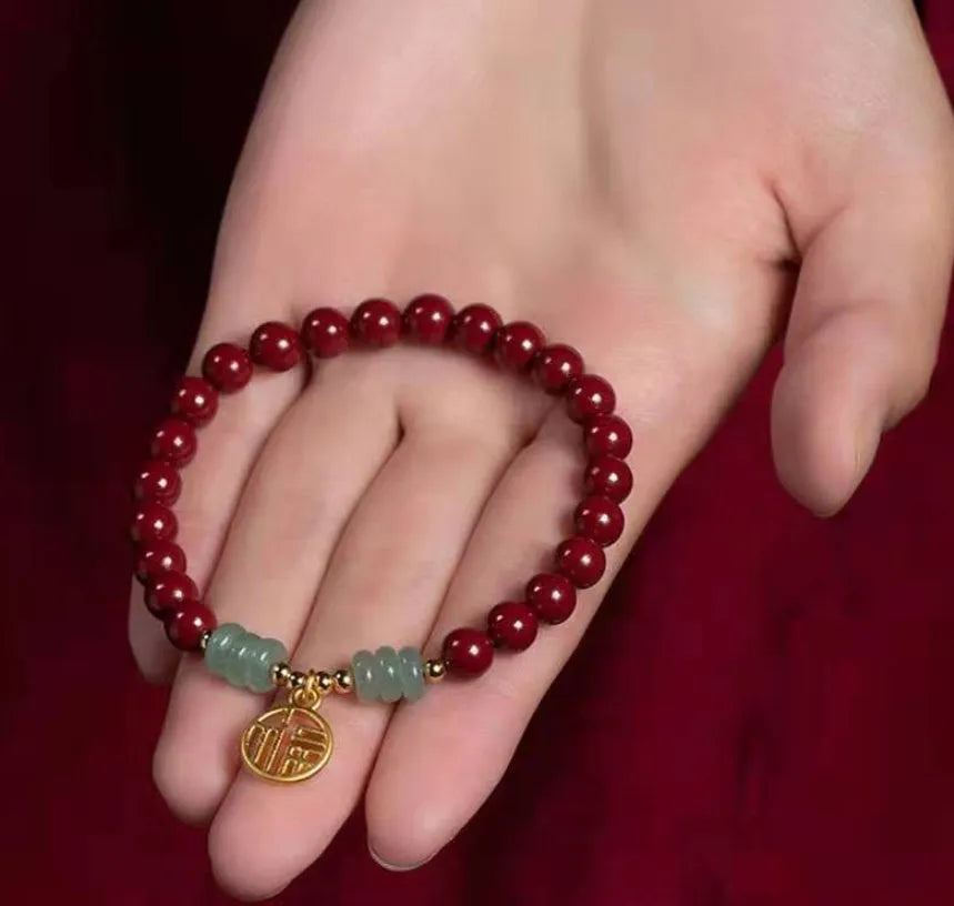 Handmade gold cinnabar wave bracelet with copper beads in national style unisex design.