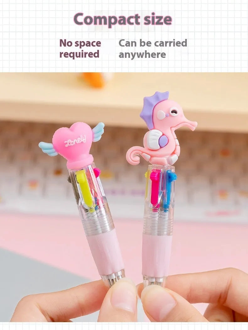 A cartoon-themed press-type ballpoint pen showing four-colour cartridge and a random print design on a silicone and plastic barrel.