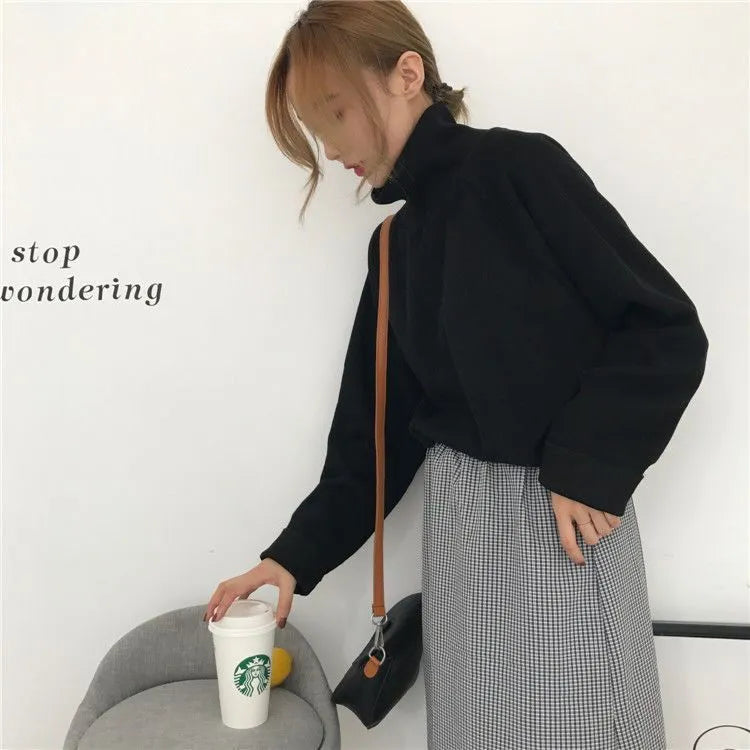 Women's loose-fit long-sleeve top with half-high collar in solid colour options