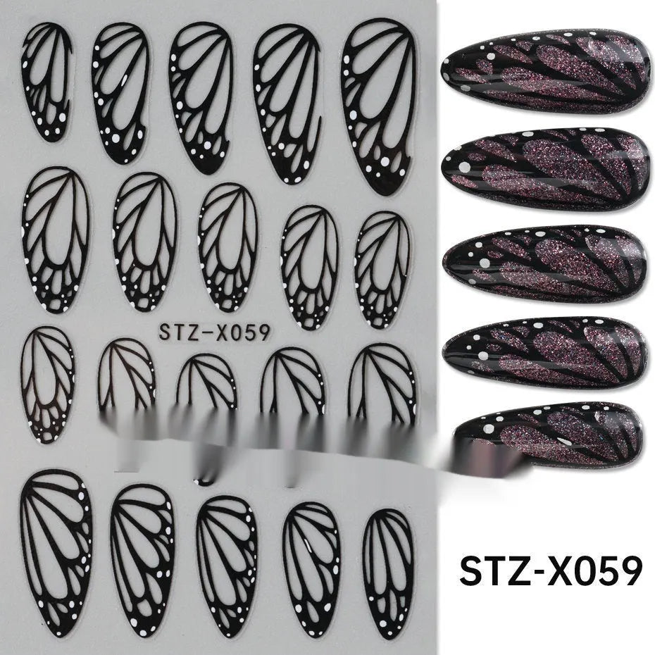 Close-up of a cartoon-style nail sticker with black and silver strips and a love pattern design on a fingernail.