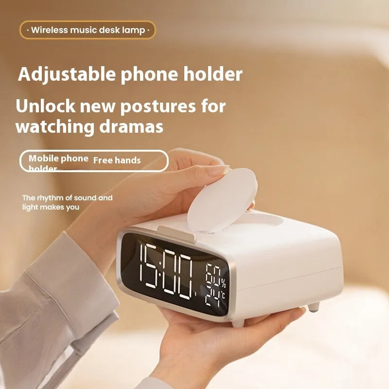 White 3-in-1 wireless charging pad with integrated Bluetooth speaker and soft-glow night light.