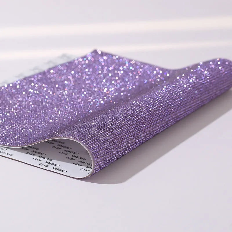 Rhinestone adhesive sheet with eight-eye pattern in multiple colour options on white background
