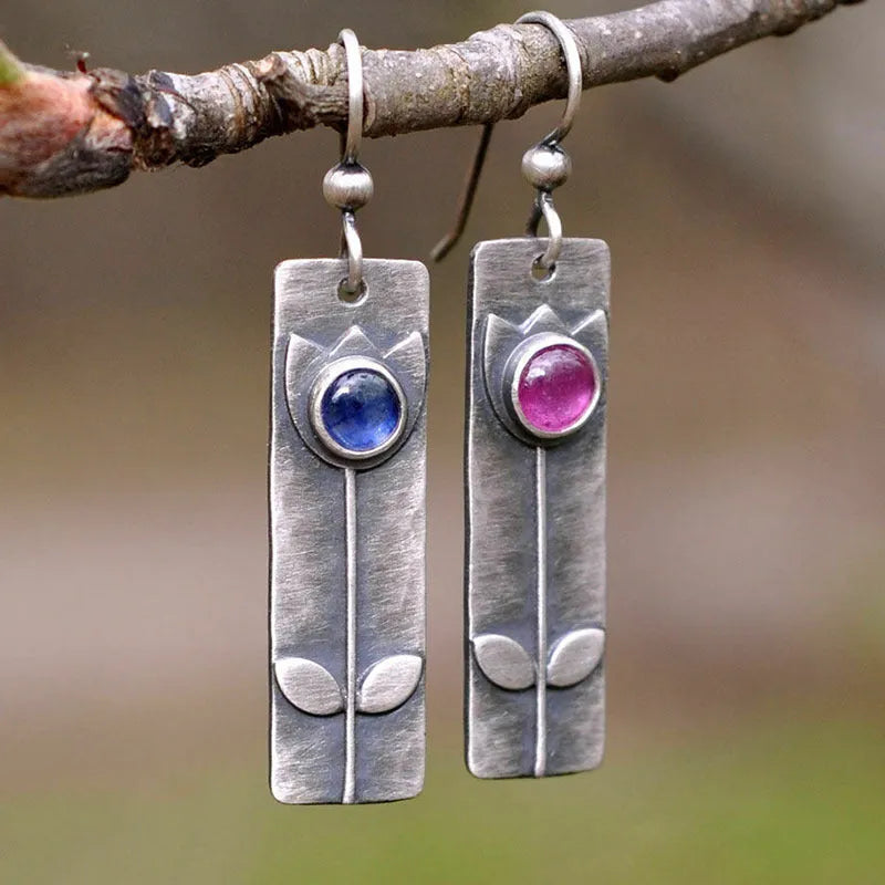 Antique finish red sapphire earrings with geometric ellipse shape in retro style