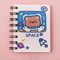 Astronaut-themed flipper notebook measuring 10.5cm by 8cm with space design cover options
