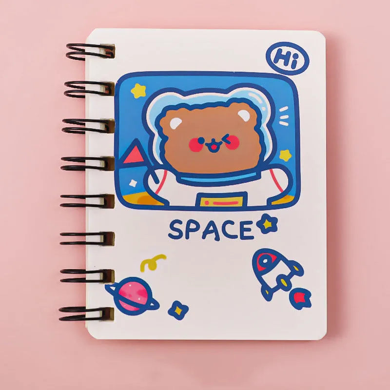 Astronaut-themed flipper notebook measuring 10.5cm by 8cm with space design cover options