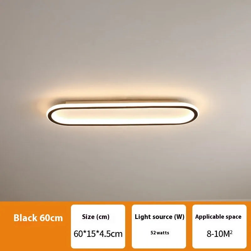 Slim aluminium strip ceiling lamp with PVC diffuser in a minimalist design for corridor or bedroom lighting.