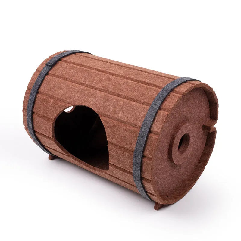 Assembled wine barrel shaped cat bed made from grey polyester fibre felt.