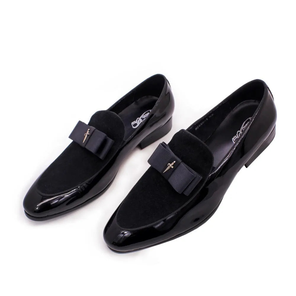 Men's black patent leather low-top dress shoes with a tassel detail on the front.
