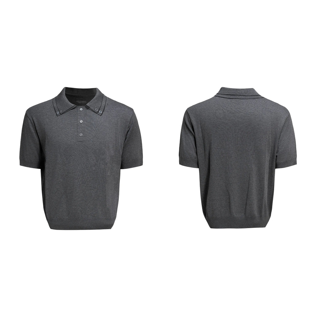 Man wearing a grey double collar knit short sleeve t-shirt.