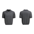 Man wearing a grey double collar knit short sleeve t-shirt.