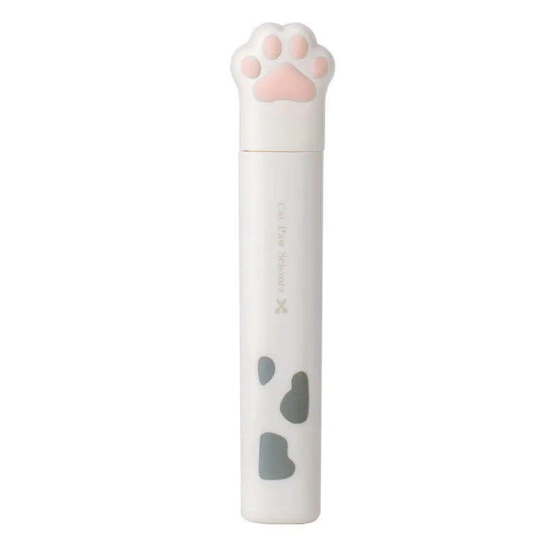 Closed pink cat paw mini folding safety scissors showing the cartoon handle design.