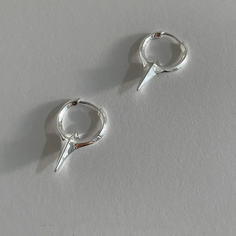 Geometric star shaped ear clips for women with electroplated copper construction and white gold plating