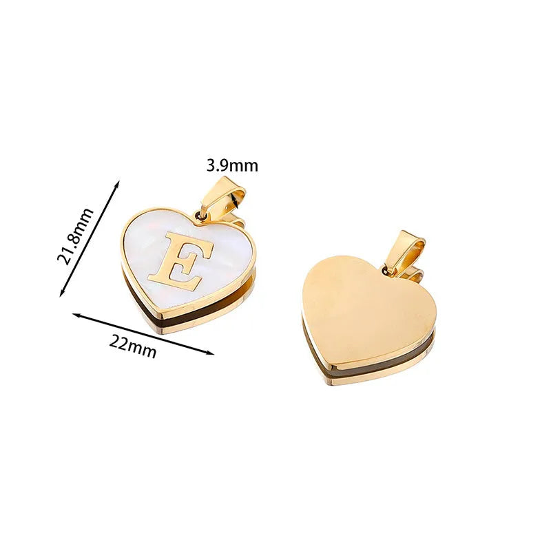 Gold heart necklace with white shell detail and personalised initial letter on adjustable chain