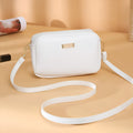 Solid colour PU ladies' shoulder bag with three-dimensional pockets in urban simplicity style