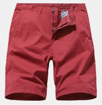 Men's blue denim loose-fit casual shorts with a straight leg and no belt, laid flat.