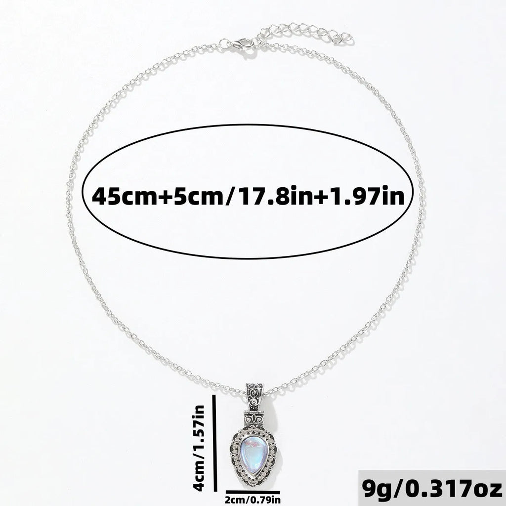Silver heart-shaped vintage moonstone drop necklace on alloy chain