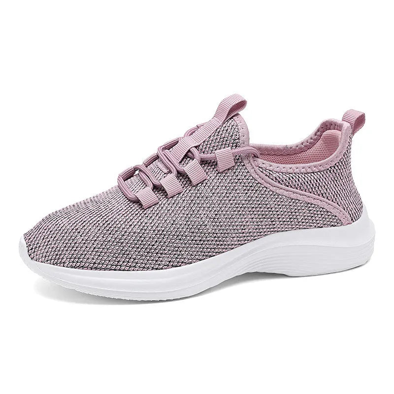 Women's low-top Flyknit mesh sneaker in black with round toe and lace-up front.