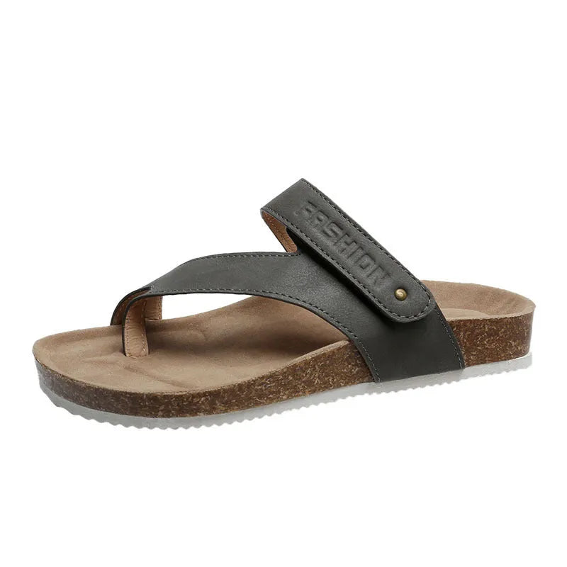 Women's flat toe ring flip-flop in a solid colour with a thick foam sole.