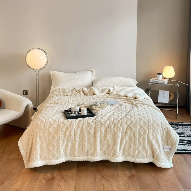 Polyester thermal flannel winter blanket in beige colour, laid flat showing its 180x200cm size and textured fabric.