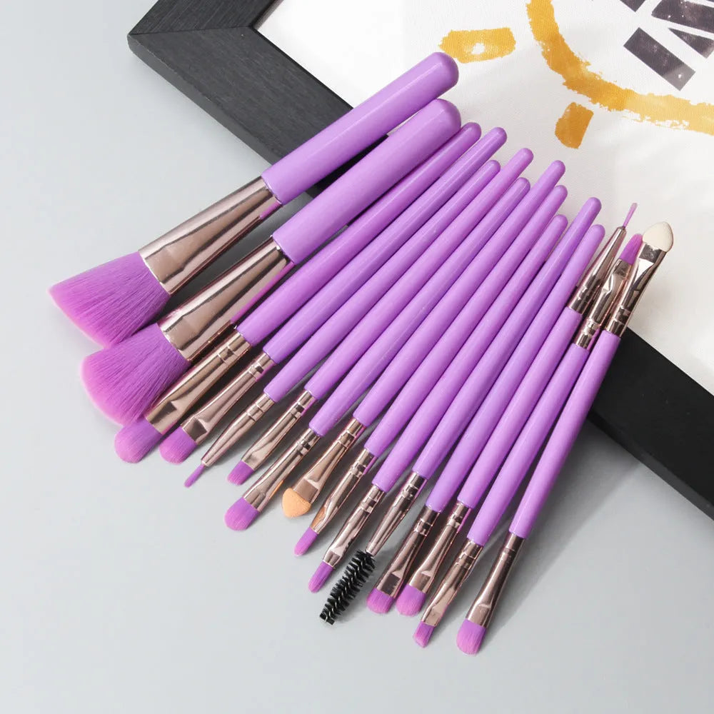 MAANGE 18-piece makeup brush set with fan-shaped cosmetic tools laid out on a table.
