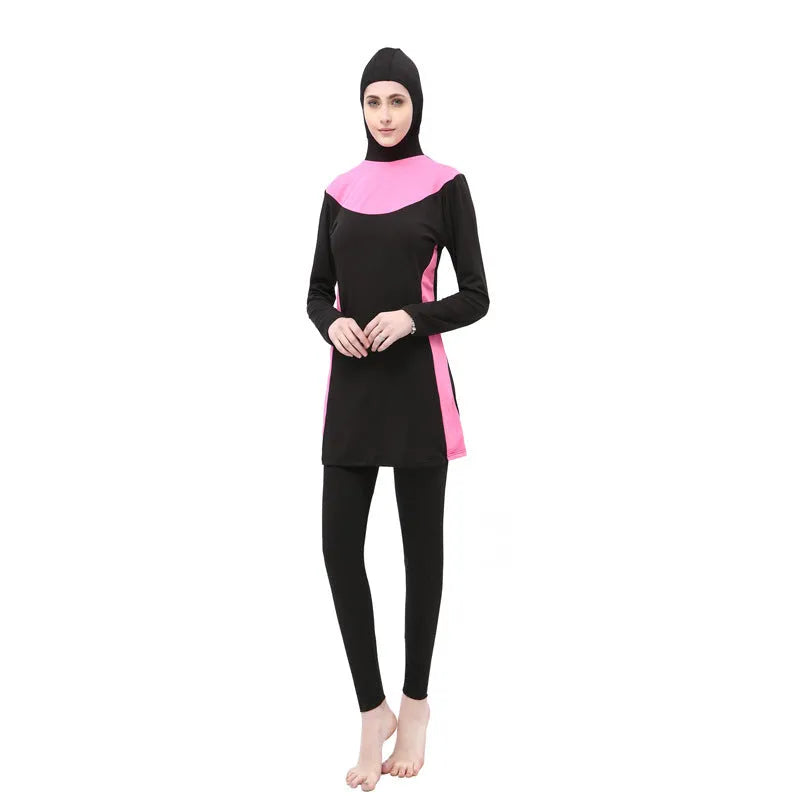 Conservative women's hooded swimsuit with long sleeves in black with rose red colour combination