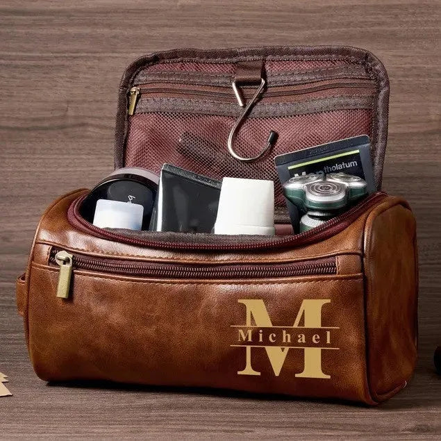 Men's black PU travel bag with a separate makeup pouch included