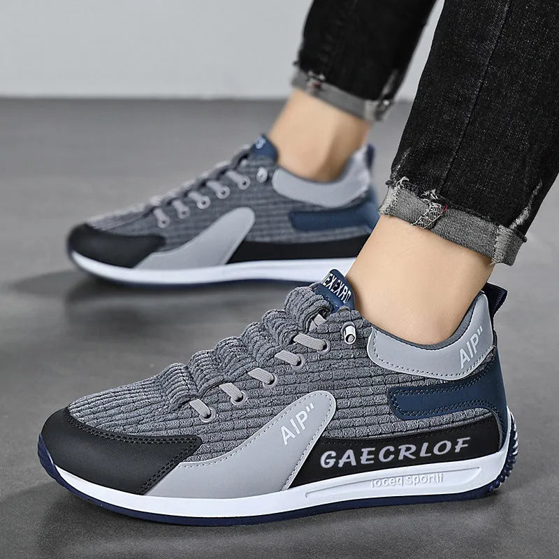 Men's green and grey mesh running shoes with viscose soles and lace-up fastening