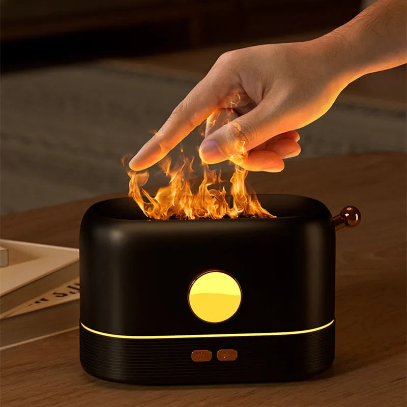 Black USB desktop humidifier diffuser with simulation flame effect and 200ml water tank.