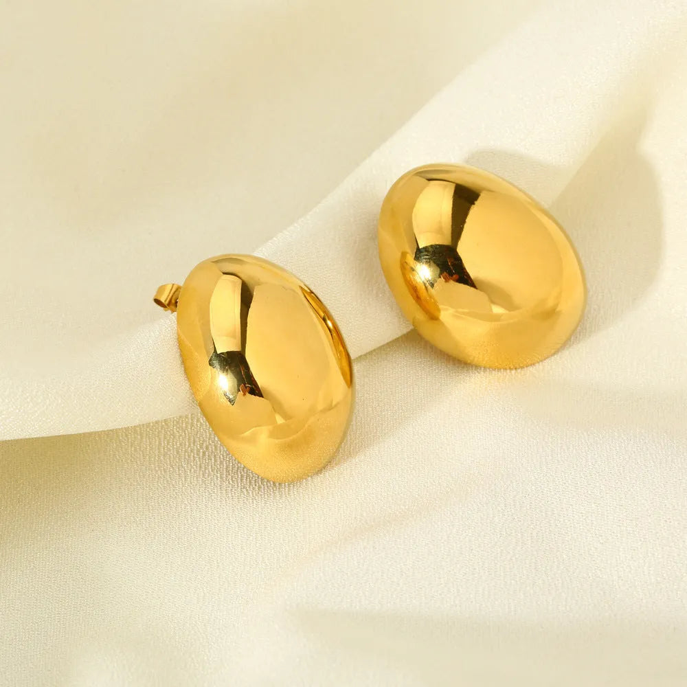 Geometric line ear studs with gold electroplated finish and glazed surface