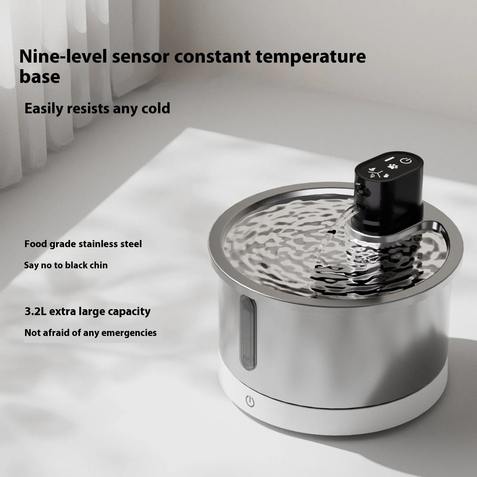 White stainless steel heated water fountain for cats and dogs on a counter